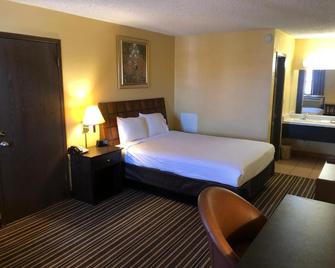 Nendels Inn & Suites Dodge City Airport - Dodge City - Ložnice