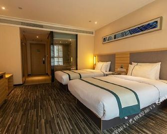 CC Inn (Zigong Wanda Plaza) - Zigong - Bedroom