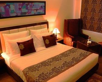 Country Inn - אמריצר - חדר שינה