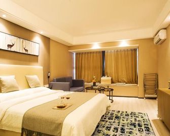 Blue Sea View Holiday Hotel - تشينغداو - غرفة نوم