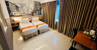 Avirahotel Makassar Panakkukang - מקאסר - חדר שינה