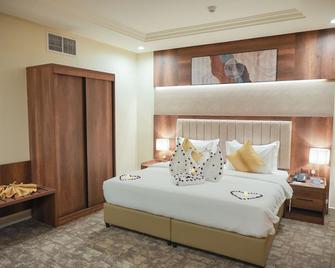 Al Mada Al Arabia Hotel - Jazan - Bedroom