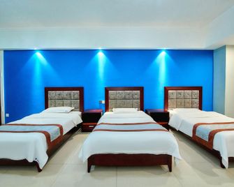 Lanjing Apartment Hotel - Hohhot - Schlafzimmer