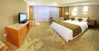 International Golf Resort Hotel - Baoshan - Schlafzimmer