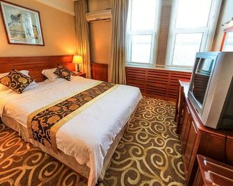 Chang Bai Shan Hotel - Baishan - Bedroom