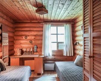 Vacation home Revonkanta in Ristijärvi - 6 persons, 2 bedrooms - Ristijärvi - Camera da letto