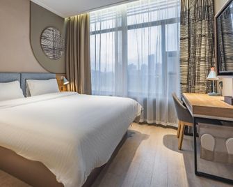Home Inn Neo Wuhu Economic Development Zone Fantawild Park - Wuhu - Bedroom