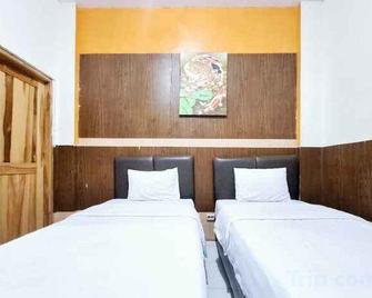 Nirvana Inn Gejayan Yogyakarta mitra RedDoorz - Yogyakarta - Habitació