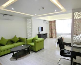 Haikou Jiuju Youjian Hotel - Haikou - Living room
