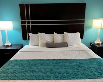 Howard Johnson by Wyndham Houston Heights/Downtown - Houston - Habitación