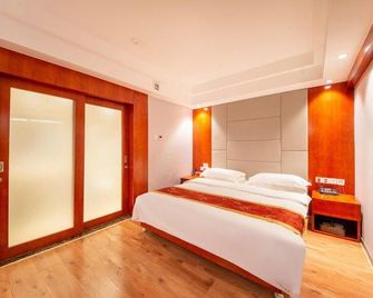 Jinpu Hotel - Yulin - Habitación