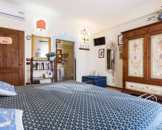 B&B New Day - אסיסי - חדר שינה