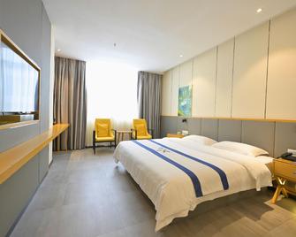 Heng Da Hotel (Yulin Railway Station Zhongyaogang) - Yulin - Bedroom