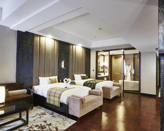 Regao Hot Spring Hotel - Фушунь - Спальня