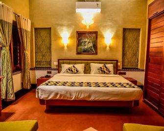 تشيمبرا أدوبي - Kalpetta - غرفة نوم