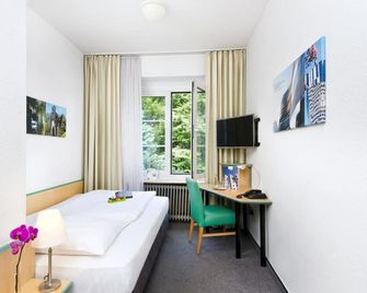 Hotel Am Hofgarten - Düsseldorf - Bedroom