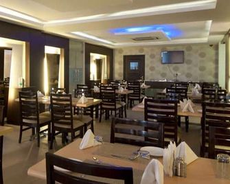 Paradise Inn Manesar - Manesar - Restaurante