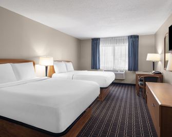 Travelodge by Wyndham Fargo West Acres - Fargo - Bedroom