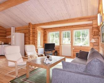 Nice home in Grums with house sea view - Grums - Living room
