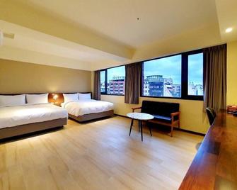 Just live inn - New Dahua - Thành phố Cơ Long - Phòng ngủ