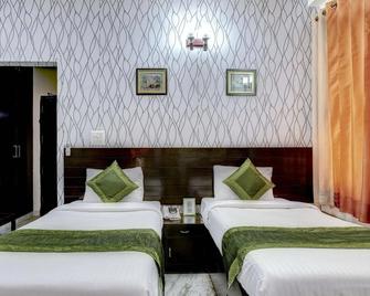 Treebo Trip Casa Cyber Dlf Phase 3 - Gurugram - Bedroom