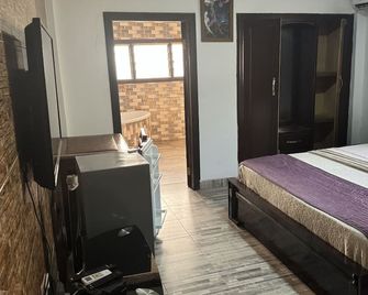 Larosa Executive Guest House - Кумасі - Спальня