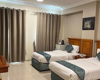 Al Murooj Hotel Apartments - Muscat - Bedroom