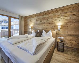 Alpenparks Hotel & Apartment Sonnleiten - Saalbach - Habitación