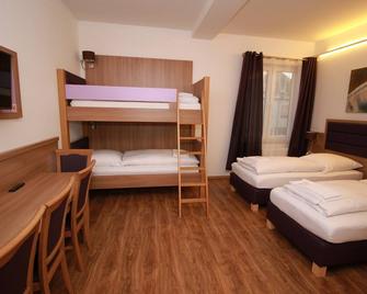 Slamba Hostel Augsburg - Augsburg - Bedroom