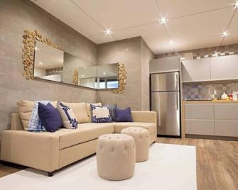 Pr Rentals | Beach Front Penthouse | A 604 - Carolina - Sala de estar