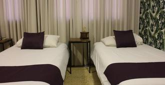 City Hotel - Posadas - Bedroom