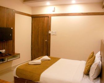 Sakura Inn - Hosūr - Bedroom