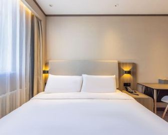 Hanting Hotel Jiuquan Changxing Electric Market - Jiuquan - Спальня