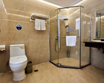 Greentree Inn Hunan Jishou Longshan Yuelu Avenue Business Hotel - Enshi - Bedroom