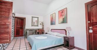 Hotel Las Tres Banderas - Manuel Antonio - Schlafzimmer