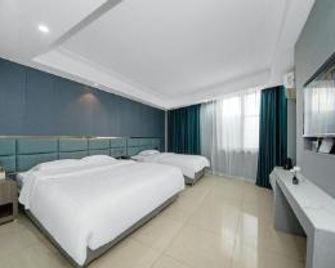 Guangzhou Junyi Apartment Hotel (Zhongcun) - Cantón - Habitación