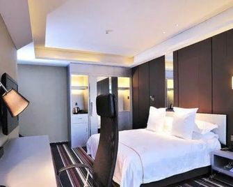 Urumqi Bayinhe Hotel - Ürümqi - Bedroom