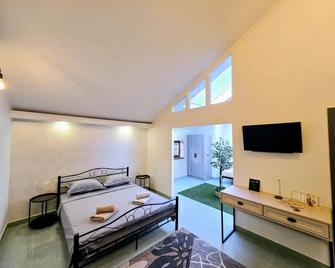 Caribian Hotel Yerevan - Jerevan - Makuuhuone