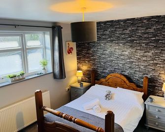 The Lake View Hotel - קרנרפון - חדר שינה