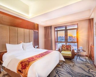 Datong Huamao Grand Hotel - Датон - Спальня