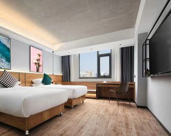 Hillhouse International Hotel (Oriental Wanda High-Speed Railway Station Branch) - Dongfang - Bedroom