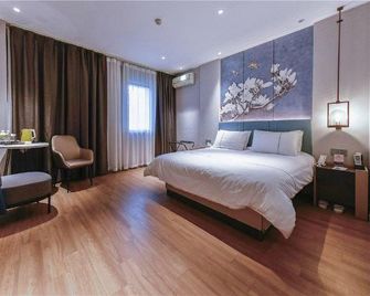 Magnotel Business Changchun Convention & Exhibition Center - Changchun - Habitación