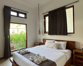 Nomada Villas - Kuta - Schlafzimmer