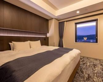 Hotel Granbinario Tsuruga - Tsuruga - Slaapkamer