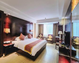 Wandu Hotel - Wanning - Bedroom