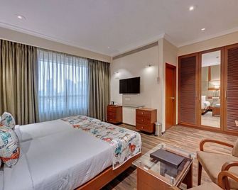 أديفا ريزيدنسي بيكون، جرانت رود، مومباي - مومباي - غرفة نوم