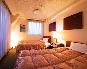Hotel Town Ekimae - Kochi - Κρεβατοκάμαρα