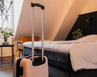 A comfortable room with the right facilities and accessibility - Appeltern - Bedroom