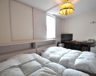 Tomikawa City Hotel - Tomakomai - Ložnice