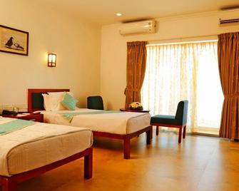 Green Fields Kumarakom - Kumarakom - Bedroom